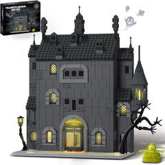 OQMI Haunted House front view shows a four-story gothic mansion for immersive display.