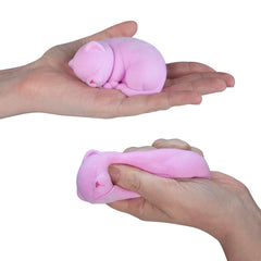 Pink cat with flocked texture offers fuzzy grip for calming squeezes.