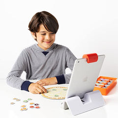 Osmo Pizza Co. box contents showing storage for game pieces