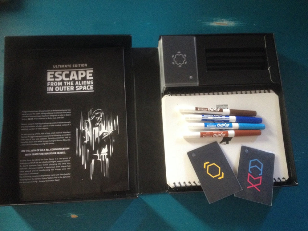 Osprey Games Escape from the Aliens dry-wipe pens highlight reusable tools for quick setup.