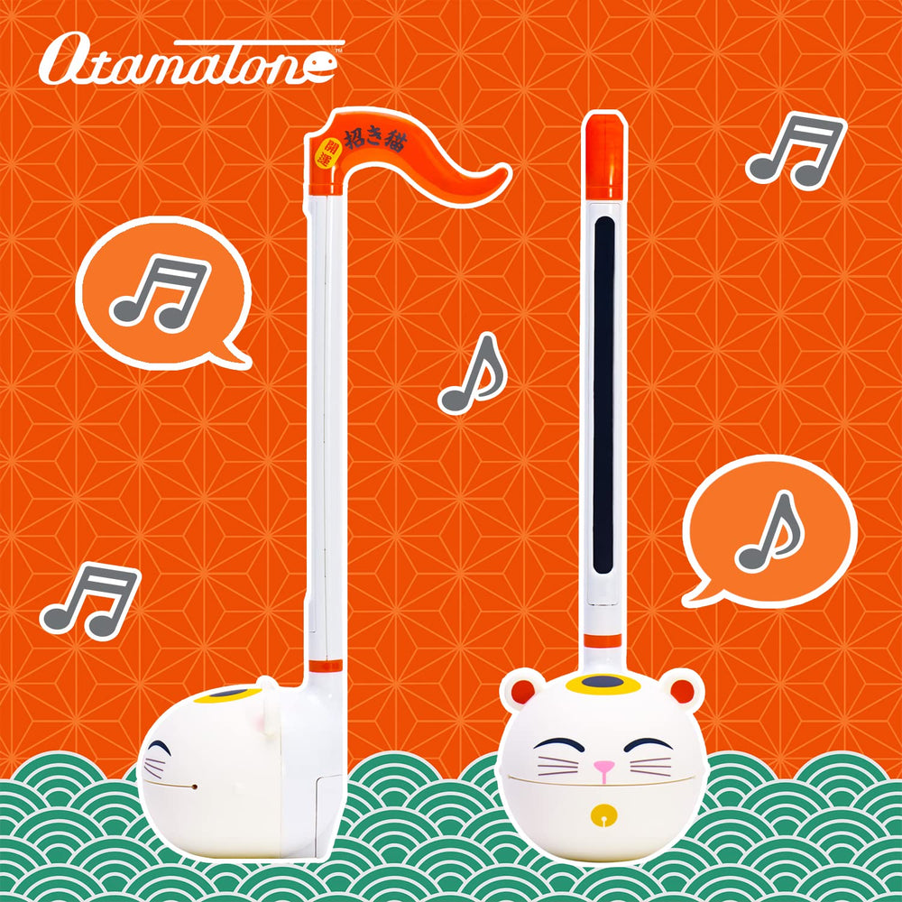 Otamatone Classic Lucky Cat side view highlights portable setup for on-the-go jams.