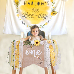 OTURGC Bee Theme Banner on high chair adds a festive focal point.