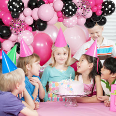 Ouddy Party assembled mouse arch display with pastel accents at party backdrop.