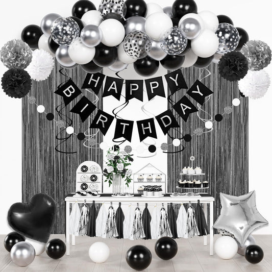 Ouddy Party black and white confetti balloons create a chic birthday focal point.