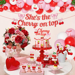 Ouddy Party red bows and ribbons finish the setup with elegant accents.