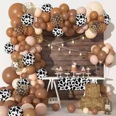 Ouddy Party western party setup frames a memorable baby shower or birthday.