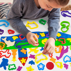 Bright-colors of Oun Nana dough tools invite creative storytelling and pretend play.