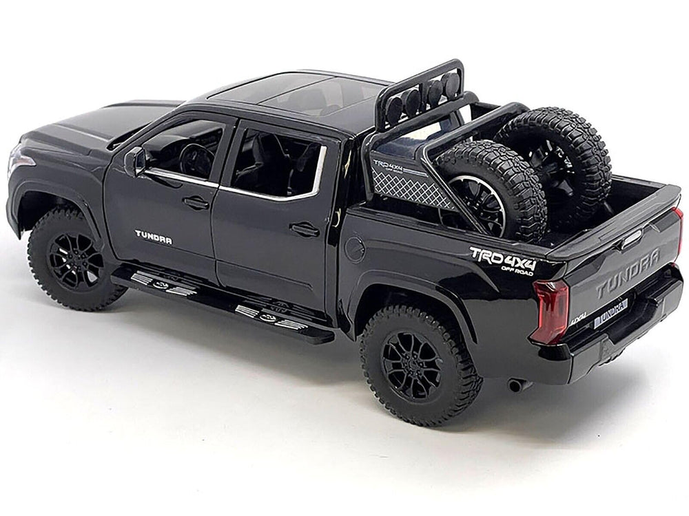 OUNAN Tundra diecast removable wheel rack adds authentic versatility for display.