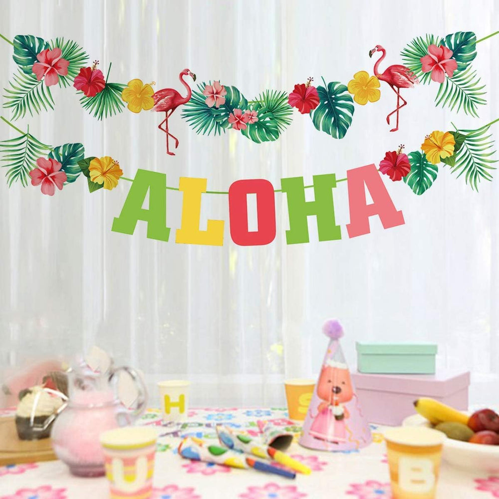 OUYANS aloha banner setup scene showcasing complete tropical party centerpiece.