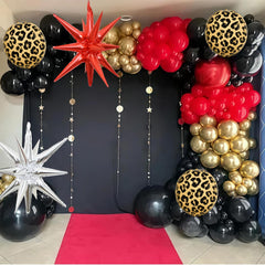 Paayeq silver star balloons elevate the garland's shimmer.