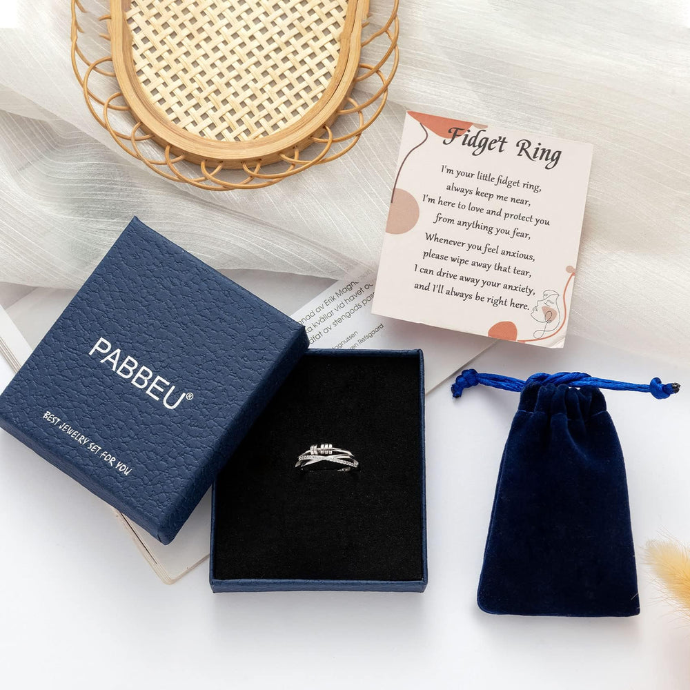 PABBEU ring worn on finger demonstrating discreet daily fidget use.