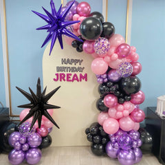 Paeyeq purple explosion star balloon creates bold focal point.