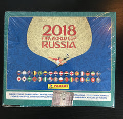 Panini Russia 2018 World Cup sticker box interior packets open view reveals 104 stickers for collecting.