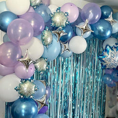 Paready pastel blue balloons soften the room with a frosty feel.