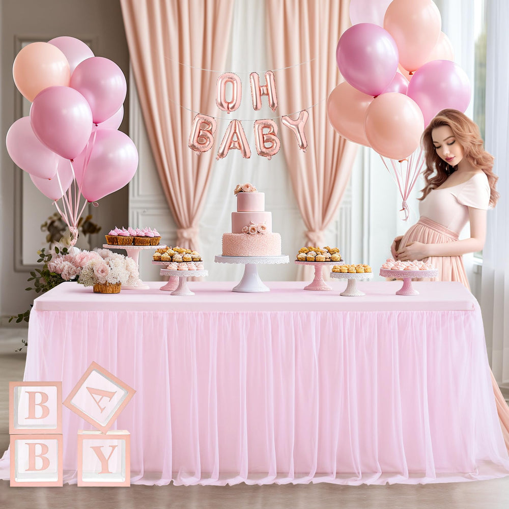 Party Talk pink tulle tablecloth drape along side for elegant decor.