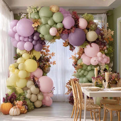 Partycus arch hung above table for birthday celebration backdrop