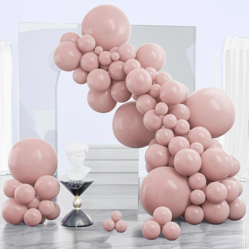 PartyWoo dusty pink 18-inch balloons arranged for a grand arch decor.