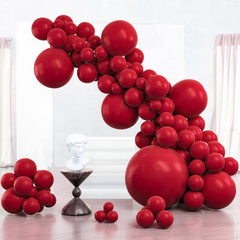 PartyWoo maroon 36-inch balloon creates a dramatic focal point for arches.