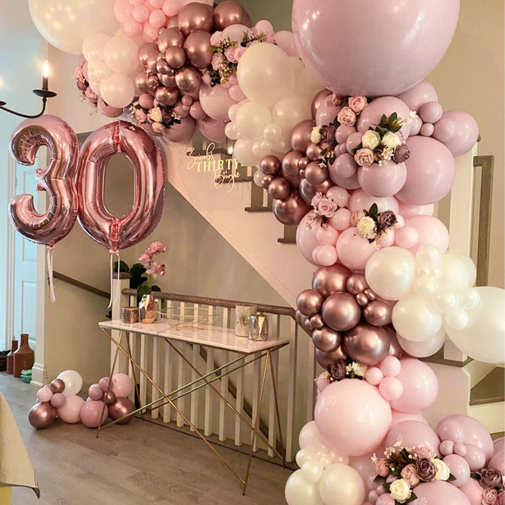 PartyWoo wedding arch using dusty pink balloons for romantic vibe.