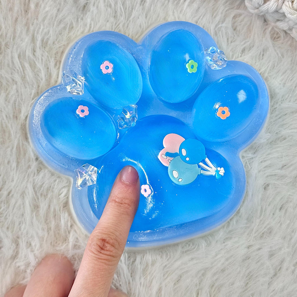 Pawfect Tail Big Taba Squishy Paw featuring decorative rhinestones and bows