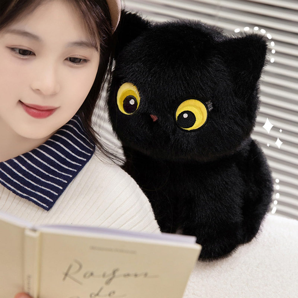 PEACH CAT black cat stuffed animal side view, ideal for cozy reading time.