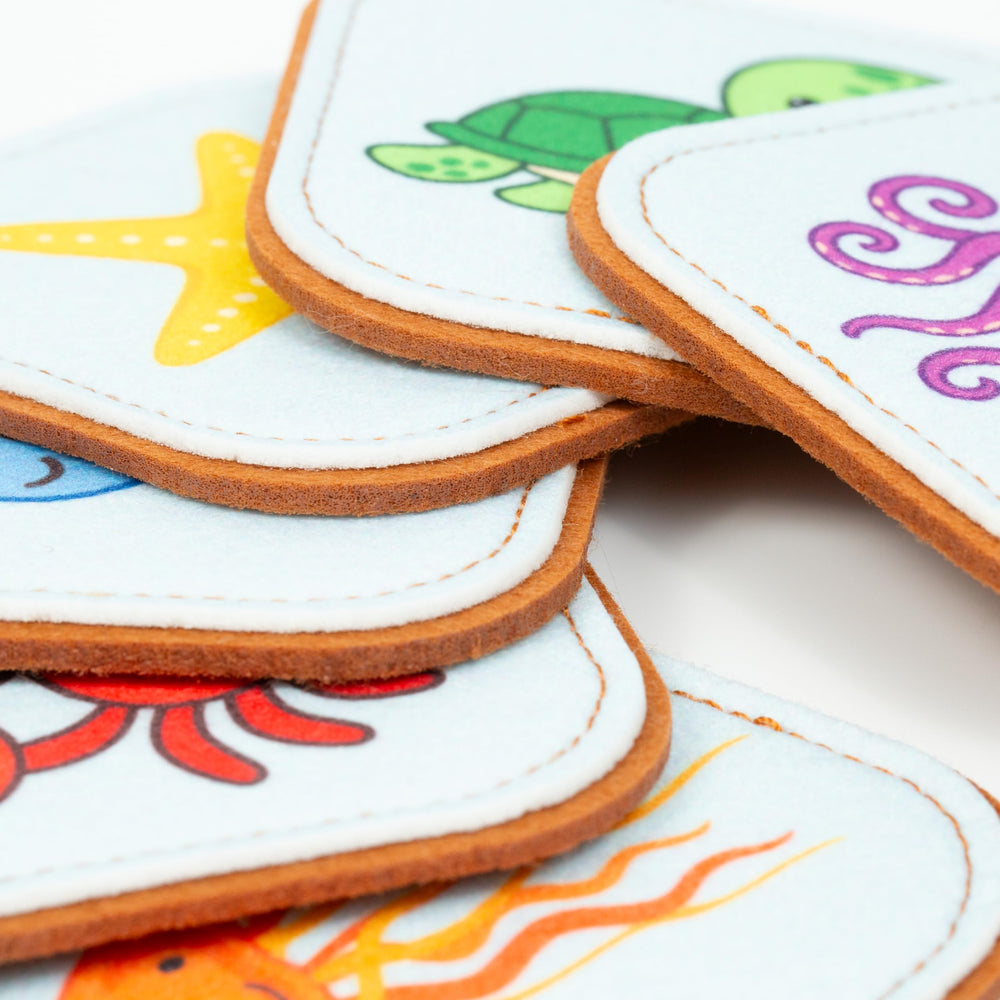 Peapod Play seahorse card supports sensory exploration with vibrant patterns