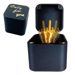 PETBSNVB Middle Finger in a Box gag gift on a desk, ideal for office pranks.