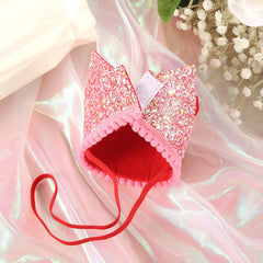 PEUTIER strawberry 1st birthday hat used as a gentle photo prop for greetings.