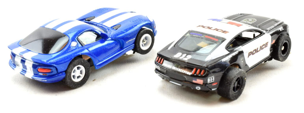 PH Premium Hobbies Mustang vs Viper showpiece for thrilling HO racing sessions.