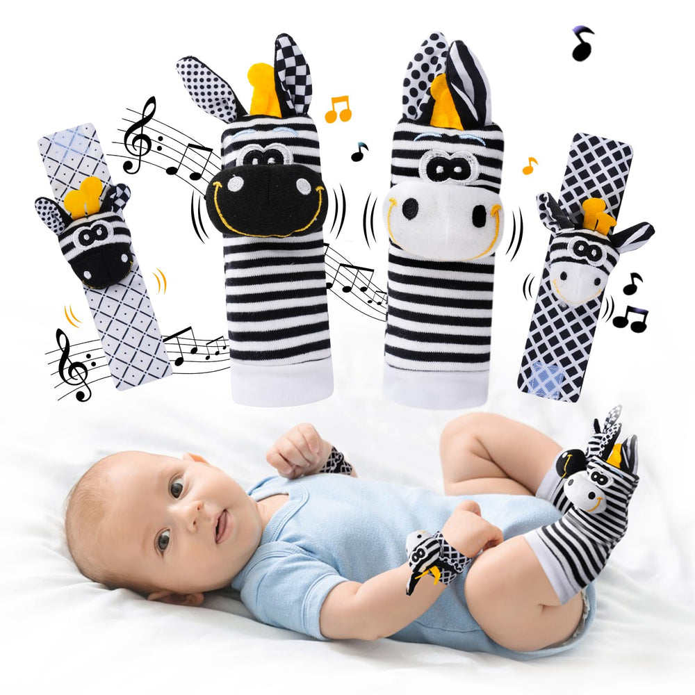 PHEZAPA wrist rattle socks in black and white stimulate newborn visual attention.