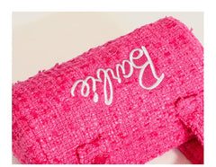 Pink Doll inside compartments keep phone, wallet, and essentials organized