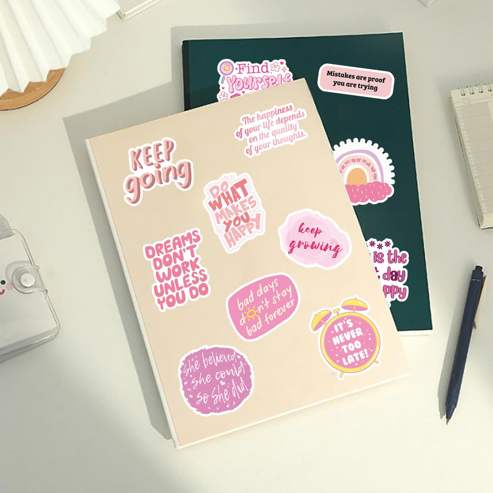 Pink motivational stickers on a phone case for uplifting notes