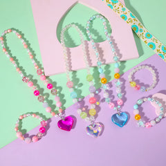 PinkSheep bracelet set in colorful beads, ideal for pretend play.