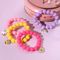 PinkSheep sunflower pendant bracelet in orange for bright, joyful styling on kids.