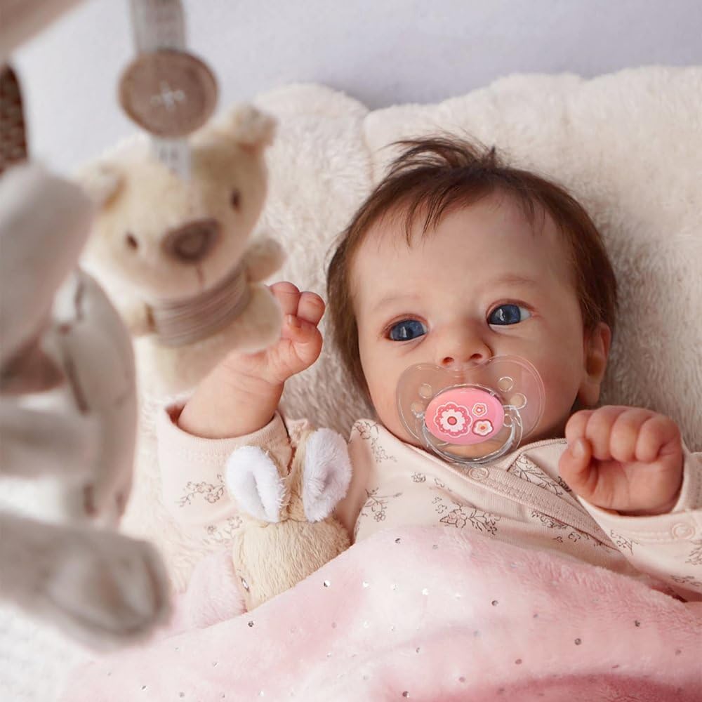 Pinky Reborn soft cloth body for gentle, hug-friendly handling.