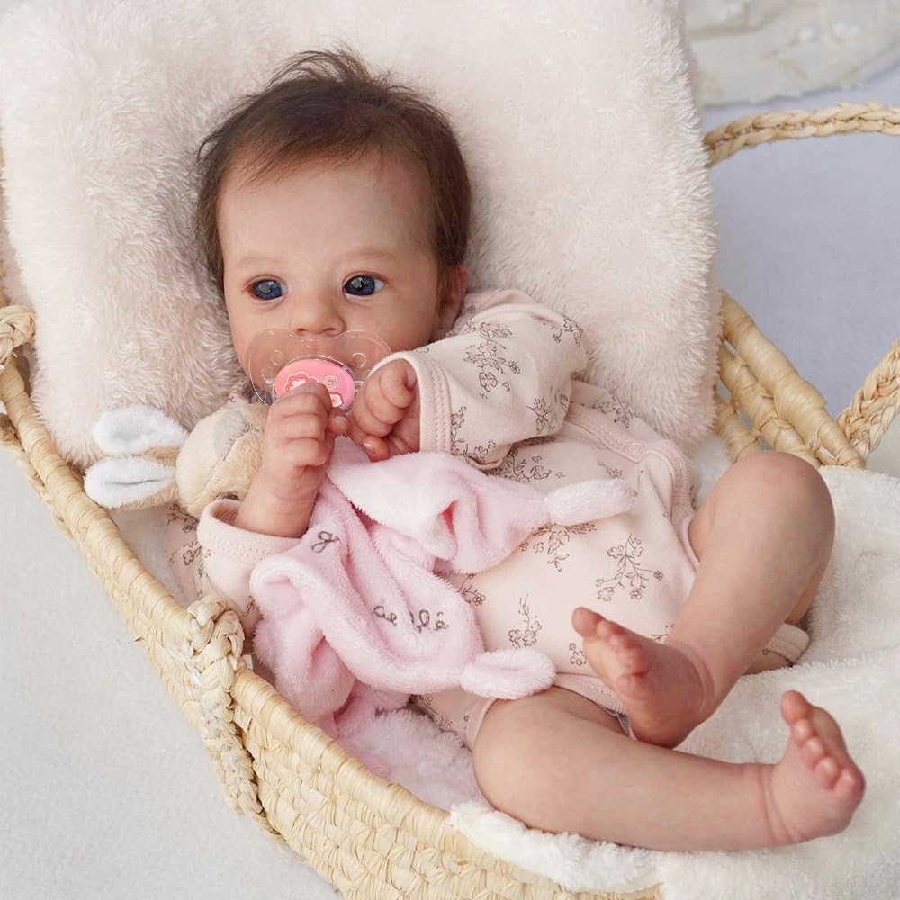 Pinky Reborn soft vinyl head and limbs for a sturdy, lifelike feel.