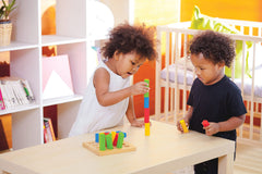 PlanToys Geometric Peg Board towers build fine motor skills and coordination