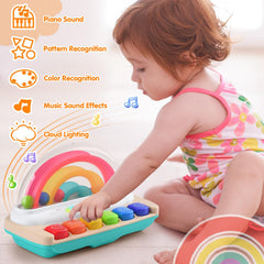 PLAY Rainbow cloud lights illuminate as toddlers press keys for sensory play.