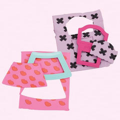 Spinning display stand showcases finished Barbie looks.