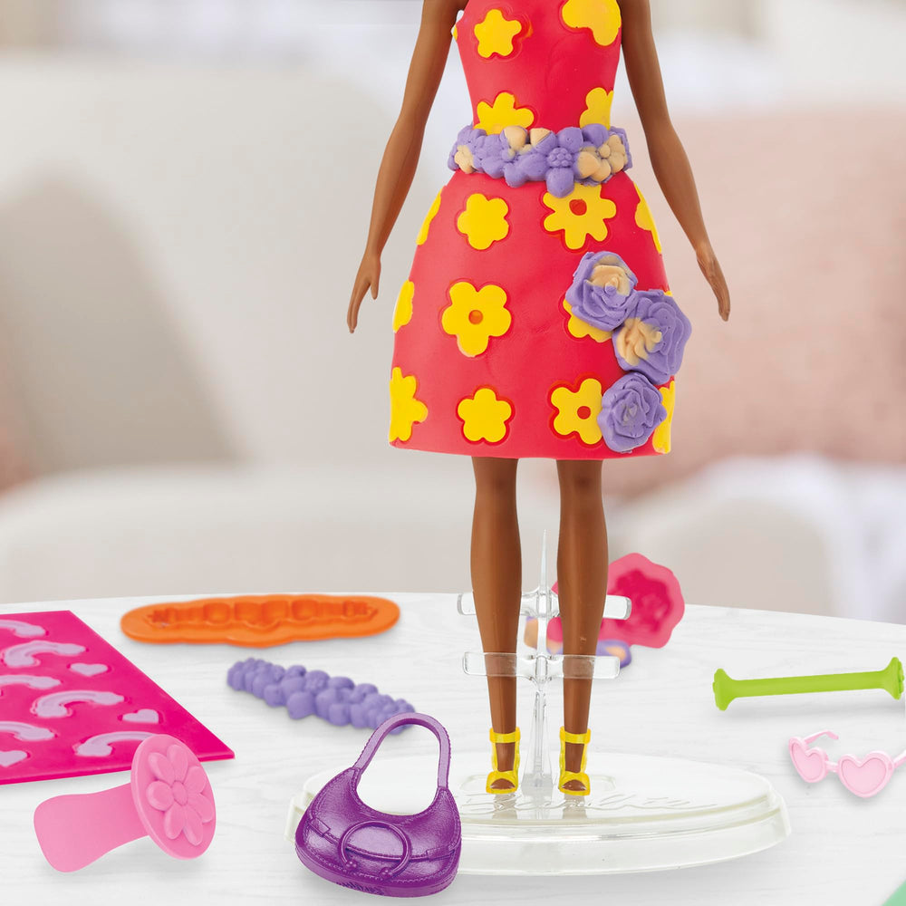 Play-Doh flowers stampers create charming floral accents on outfits.