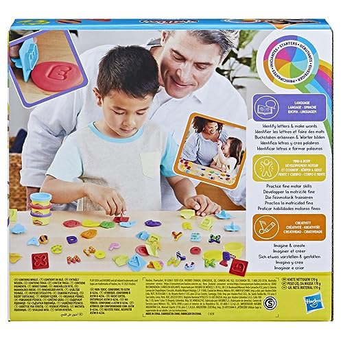 Child using Play-Doh Fundamentals stampers to form letters during learning activity