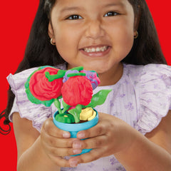 Play-Doh Blooming Flowers pot and vase display stems for a real bouquet.