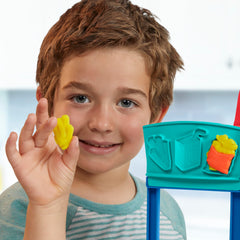 Play-Doh Kitchen Creations Busy Chef's Restaurant playset includes color packs for realistic dishes