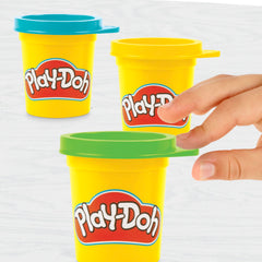 Play-Doh On-the-Go Garage packaging highlights portable storage for travel play.