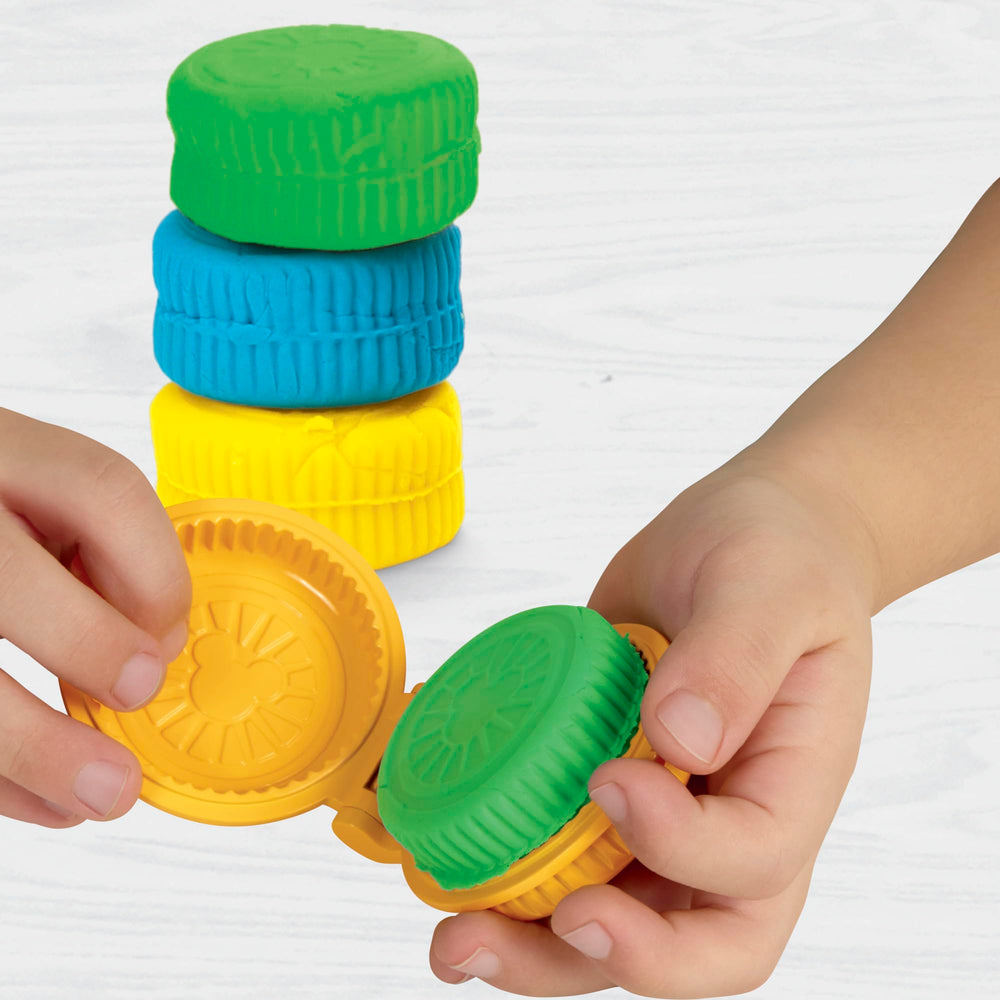 Play-Doh storage caddy with fold-out space keeps toys organized on the go.