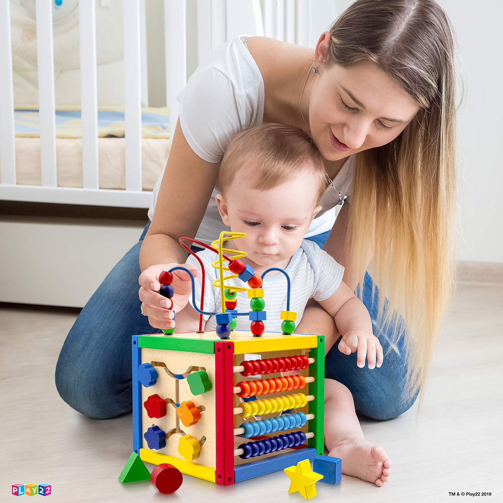 Play22 shape sorter section helps recognize shapes in a colorful cube.