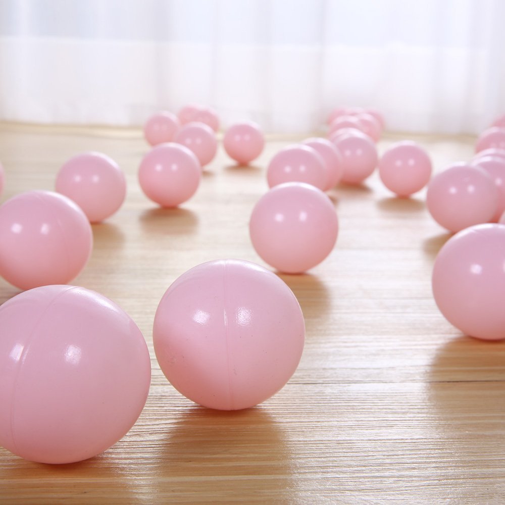 PlayMaty pink balls used as ball pool decor for a party.