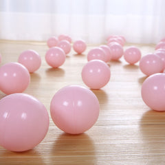 PlayMaty pink balls used as ball pool decor for a party.