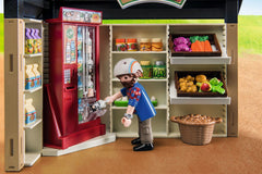 Playmobil Country Farm Shop adult figure ready to assist shoppers.