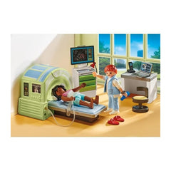 Playmobil MRI with Child: child listens to music for a soothing pretend procedure.